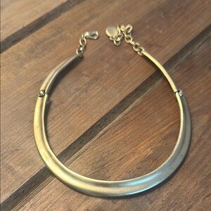 Gold Toned Curved Collar Necklace with Modern Design